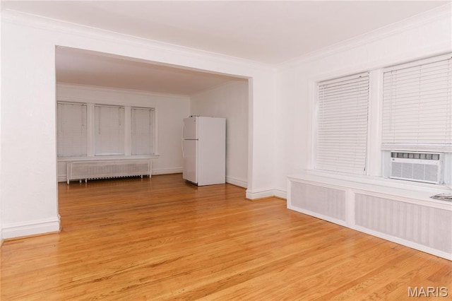 7360 Dartmouth Ave, University City, MO 63130 - unfurnished room with radiator, ornamental molding, light wood finished floors, and cooling unit