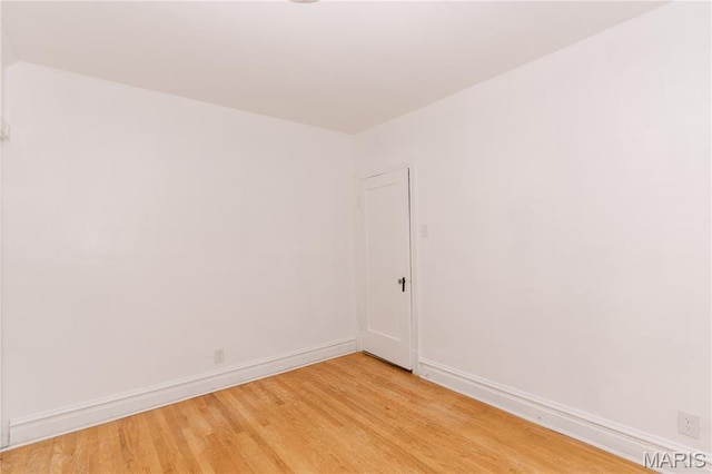 7360 Dartmouth Ave, University City, MO 63130 - spare room with light wood finished floors and baseboards