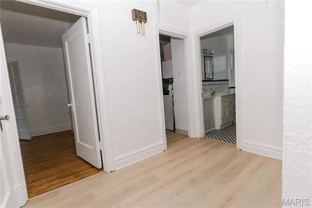 7360 Dartmouth Ave, University City, MO 63130 - hallway with light wood-style flooring