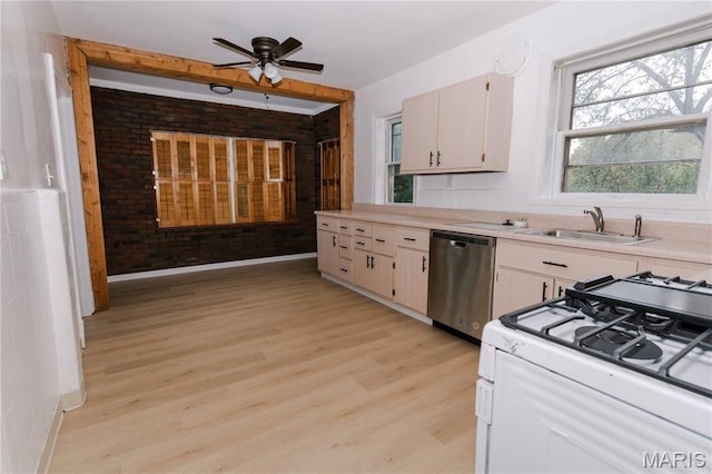7360 Dartmouth Ave, University City, MO 63130 - kitchen with stainless steel dishwasher, white range with gas cooktop, brick wall, light countertops, and a ceiling fan