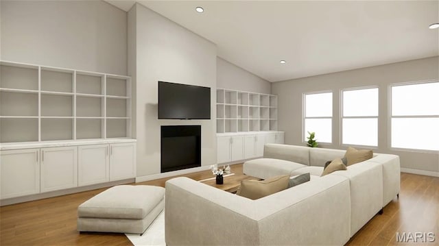 31634 Dogwood Ln, Foristell, MO 63348 - living room featuring lofted ceiling, wood finished floors, recessed lighting, built in shelves, and baseboards