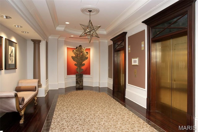150 Carondelet Plz Unit 702, Clayton, MO 63105 - community lobby featuring ornamental molding, recessed lighting, and a decorative wall