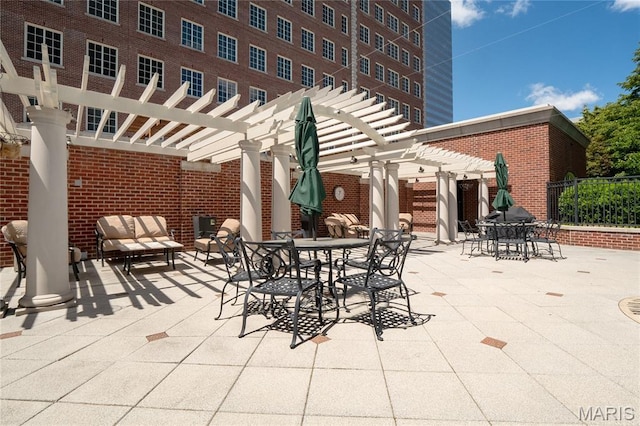 150 Carondelet Plz Unit 702, Clayton, MO 63105 - view of patio / terrace with a pergola and an outdoor hangout area