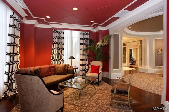 150 Carondelet Plz Unit 702, Clayton, MO 63105 - living area featuring crown molding, ornate columns, wood finished floors, and recessed lighting