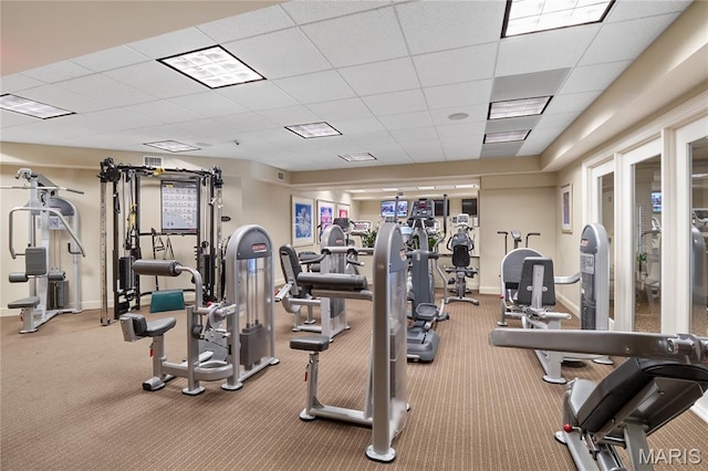 150 Carondelet Plz Unit 702, Clayton, MO 63105 - gym with a drop ceiling and carpet flooring