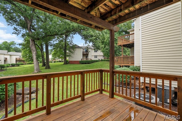 9177 Robin Ct, Brentwood, MO 63144 - wooden deck with central AC unit, a yard, and a residential view