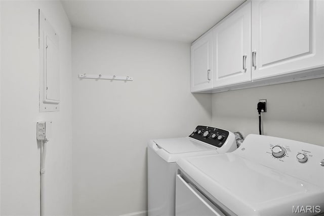 9177 Robin Ct, Brentwood, MO 63144 - laundry room featuring separate washer and dryer and cabinet space