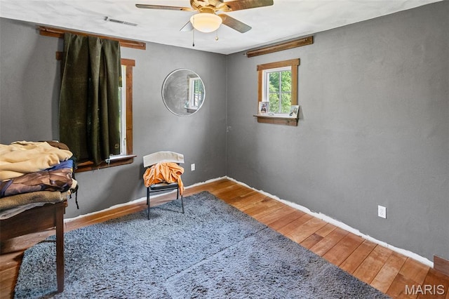 5423 Saxtown Rd, Millstadt, IL 62260 - sitting room featuring ceiling fan, wood finished floors, and baseboards