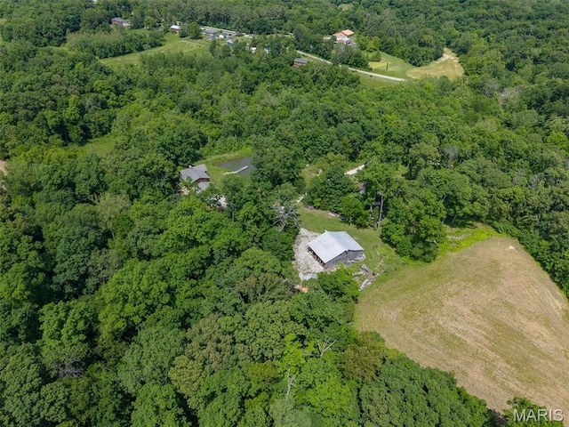 5423 Saxtown Rd, Millstadt, IL 62260 - aerial view of property and surrounding area featuring a heavily wooded area