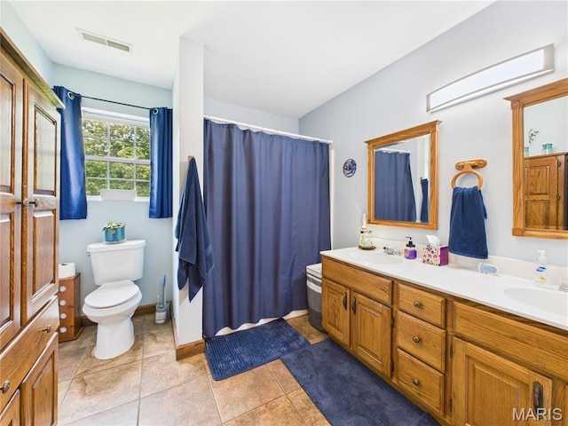 4862 State Highway 142e, Doniphan, MO 63935 - bathroom featuring toilet, double vanity, curtained shower, and tile patterned flooring