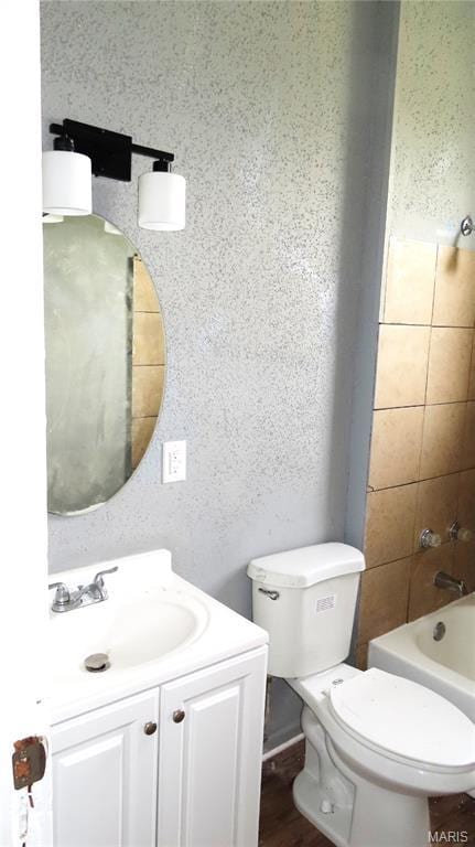 3018 N Vandeventer, Saint Louis, MO 63107 - bathroom with toilet, vanity, and bathtub / shower combination