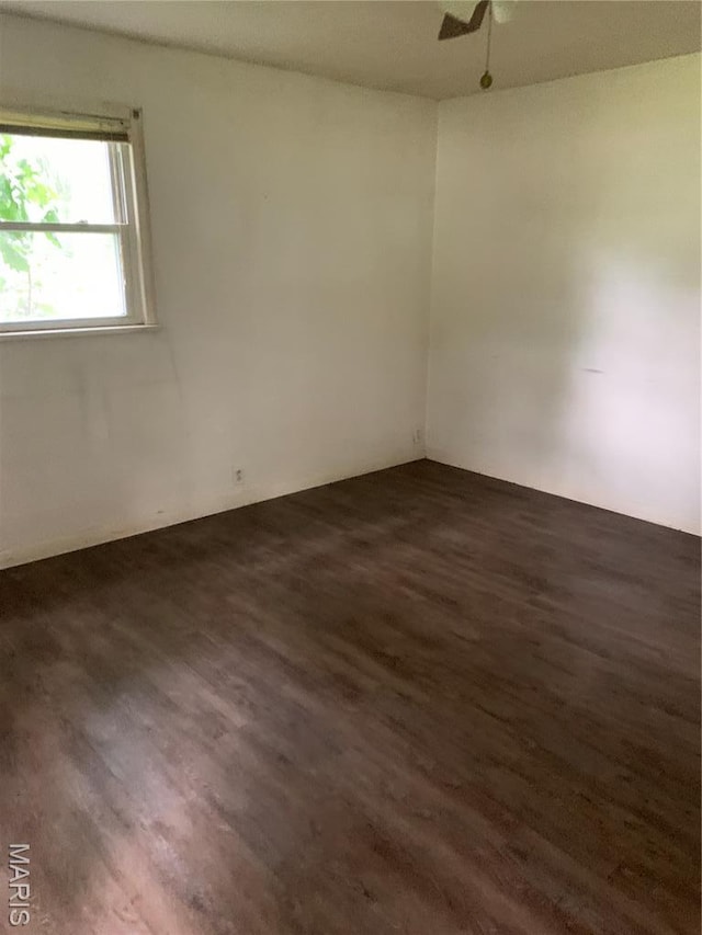 215 Berry St, Gillespie, IL 62033 - unfurnished room with dark wood-type flooring and ceiling fan