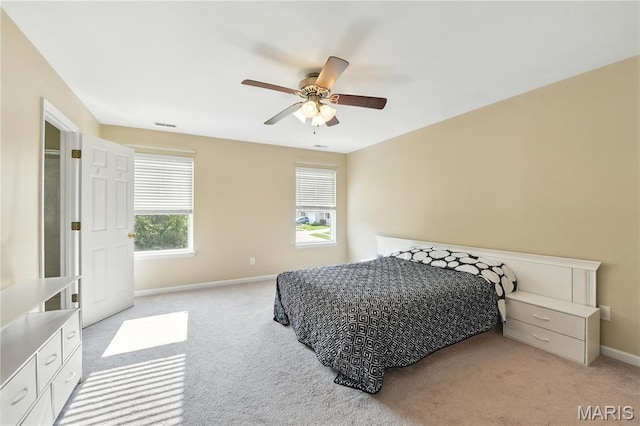 457 Spring Trce, Ofallon, MO 63368 - bedroom with light colored carpet and a ceiling fan
