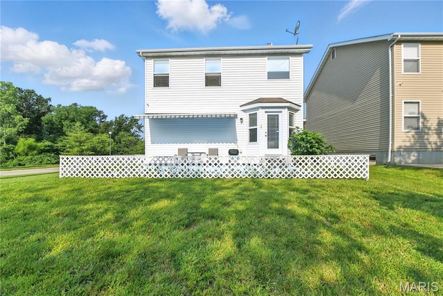 457 Spring Trce, Ofallon, MO 63368 - rear view of house featuring a yard