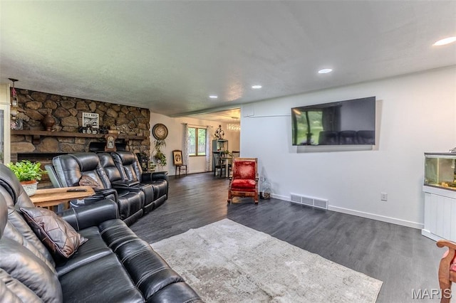 20193 SW Oakwood Dr, Lebanon, MO 65536 - living room with a fireplace, dark wood-style floors, baseboards, and recessed lighting