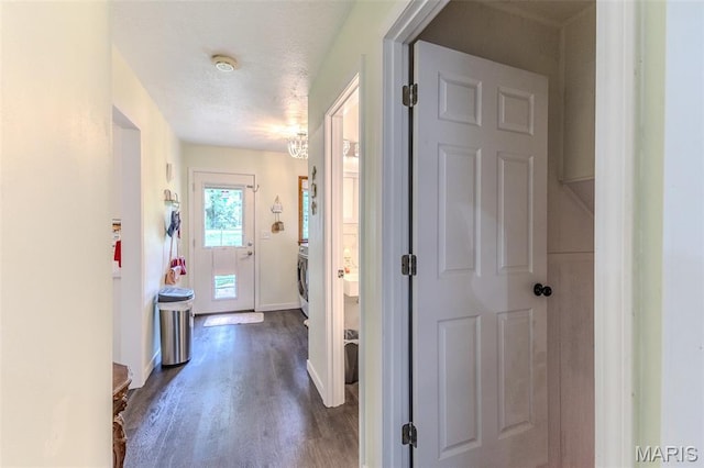 20193 SW Oakwood Dr, Lebanon, MO 65536 - corridor with dark wood-type flooring, baseboards, and a textured ceiling