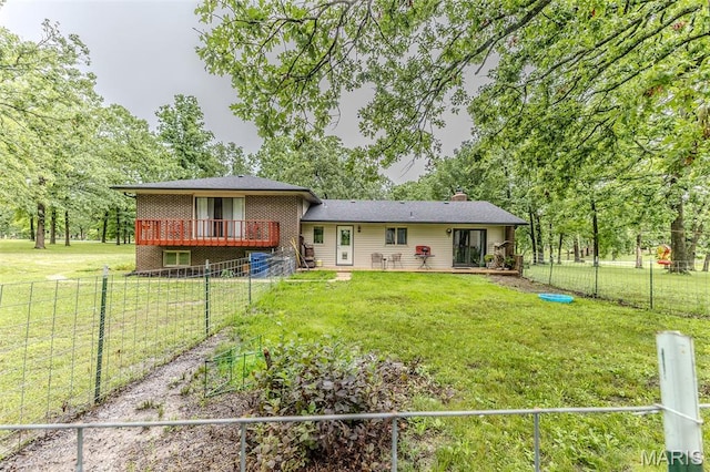 20193 SW Oakwood Dr, Lebanon, MO 65536 - back of house featuring a chimney, a deck, and brick siding