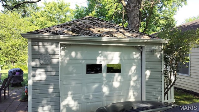 1500 Perryville Rd, Cape Girardeau, MO 63701 - view of side of home with an outbuilding and a detached garage