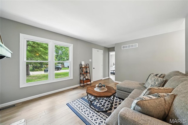 208 Mill Run Ln, Saint Peters, MO 63376 - living room featuring wood finished floors and baseboards