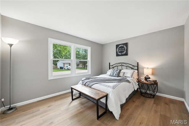 208 Mill Run Ln, Saint Peters, MO 63376 - bedroom featuring wood finished floors and baseboards
