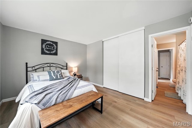208 Mill Run Ln, Saint Peters, MO 63376 - bedroom featuring light wood-style flooring and a closet