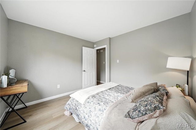 208 Mill Run Ln, Saint Peters, MO 63376 - bedroom featuring light wood-style flooring and baseboards