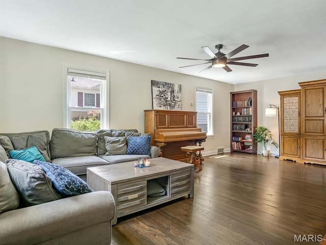 201 Banner St, Edwardsville, IL 62025 - living room featuring dark wood-type flooring, a ceiling fan, and baseboards