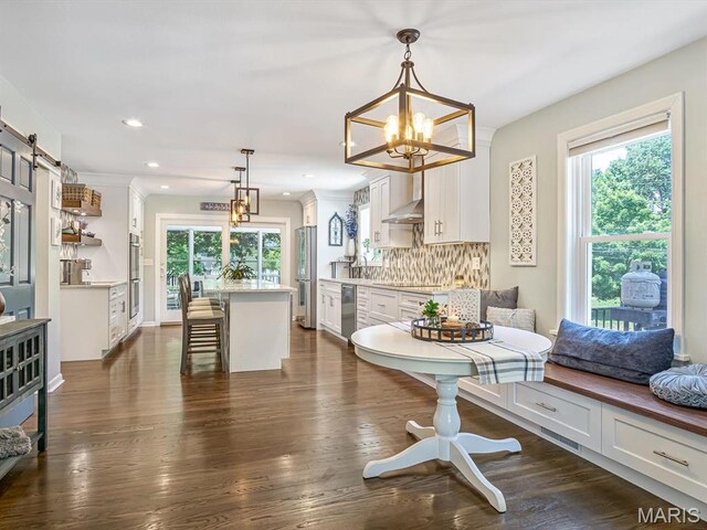 201 Banner St, Edwardsville, IL 62025 - dining space featuring a chandelier, plenty of natural light, dark wood finished floors, and recessed lighting