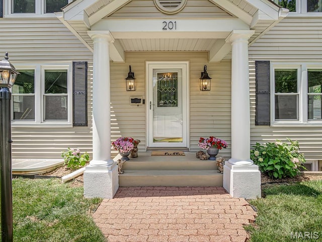 201 Banner St, Edwardsville, IL 62025 - doorway to property featuring covered porch