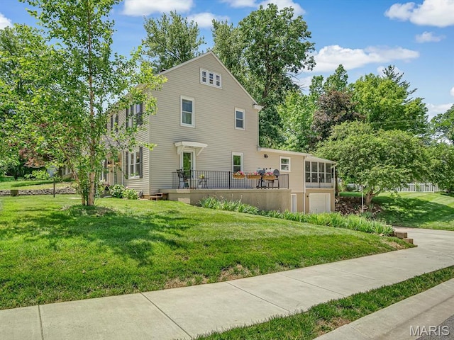 201 Banner St, Edwardsville, IL 62025 - view of home's exterior featuring an attached garage and a yard