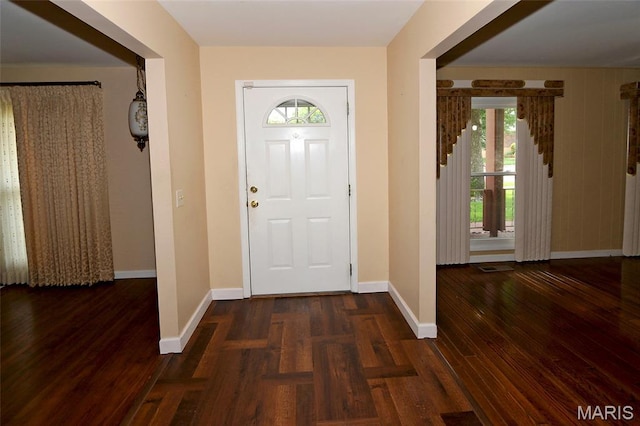 12713 Partridge Run Dr, Florissant, MO 63033 - foyer featuring plenty of natural light, wood finished floors, and baseboards