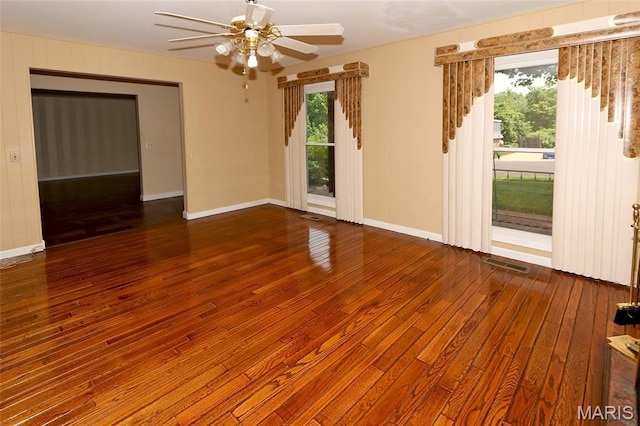 12713 Partridge Run Dr, Florissant, MO 63033 - empty room featuring hardwood / wood-style floors, ceiling fan, and baseboards