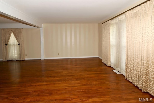 12713 Partridge Run Dr, Florissant, MO 63033 - unfurnished room with wallpapered walls, wood finished floors, and baseboards