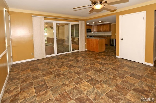 12713 Partridge Run Dr, Florissant, MO 63033 - unfurnished living room with a ceiling fan, stone finish floors, and baseboards