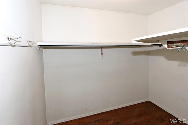 12713 Partridge Run Dr, Florissant, MO 63033 - walk in closet featuring wood finished floors