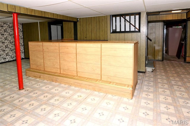 12713 Partridge Run Dr, Florissant, MO 63033 - finished below grade area featuring wood walls and a dry bar