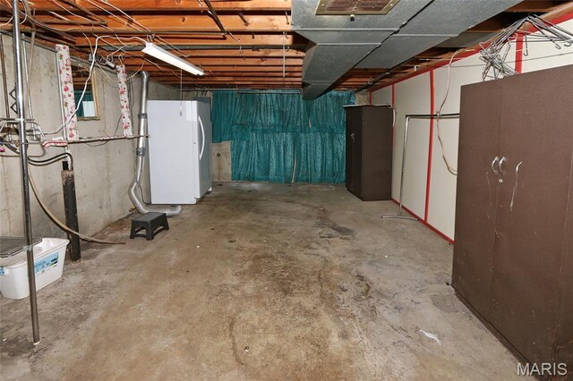 12713 Partridge Run Dr, Florissant, MO 63033 - unfinished basement featuring freestanding refrigerator