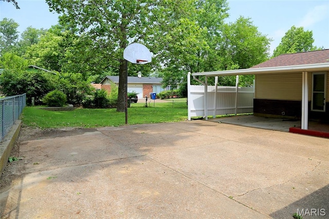 12713 Partridge Run Dr, Florissant, MO 63033 - view of patio with concrete driveway and an attached carport