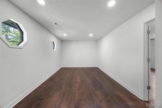 509 Saint Francois Rd, Bonne Terre, MO 63628 - basement featuring recessed lighting, wood finished floors, and baseboards