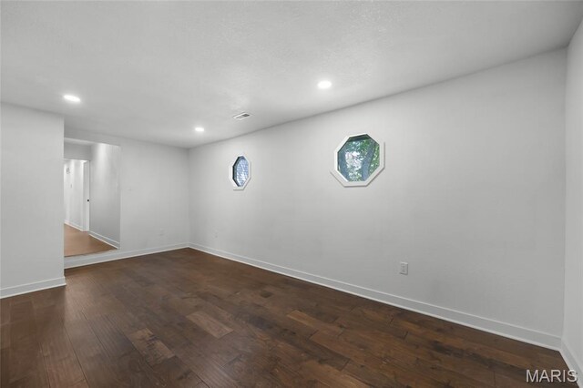 509 Saint Francois Rd, Bonne Terre, MO 63628 - basement with recessed lighting, dark wood-style floors, and baseboards