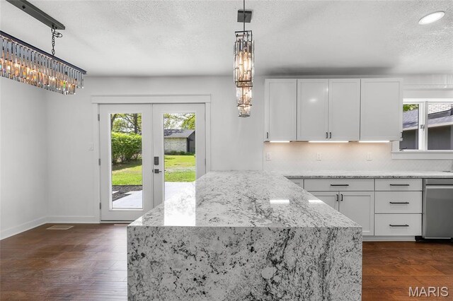509 Saint Francois Rd, Bonne Terre, MO 63628 - kitchen with light stone countertops, a textured ceiling, white cabinetry, dark wood-style floors, and recessed lighting