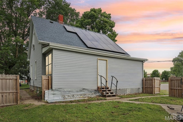 1618 N State St, Litchfield, IL 62056 - view of outdoor structure with entry steps and solar panels