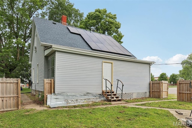 1618 N State St, Litchfield, IL 62056 - view of outbuilding featuring entry steps and solar panels
