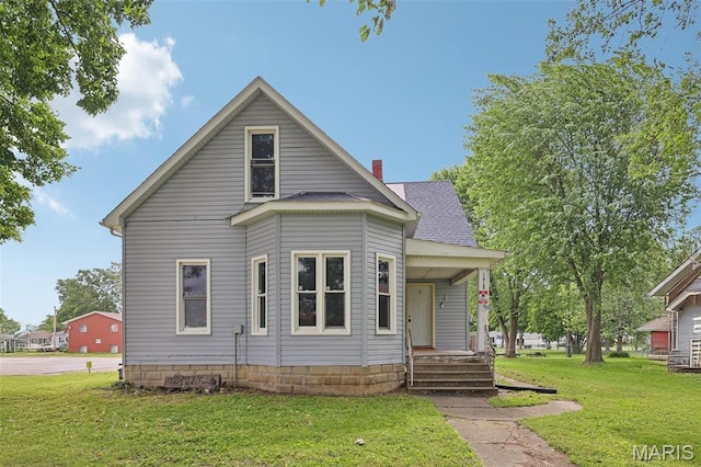 1618 N State St, Litchfield, IL 62056 - bungalow featuring covered porch and a front yard