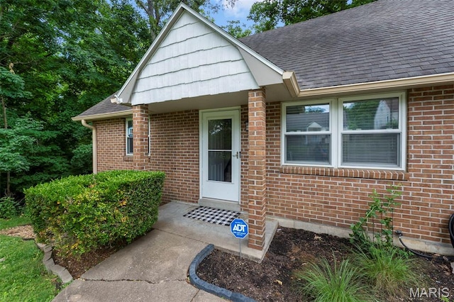 1407 Perry Ave, Cape Girardeau, MO 63701 - doorway to property with brick siding and a shingled roof