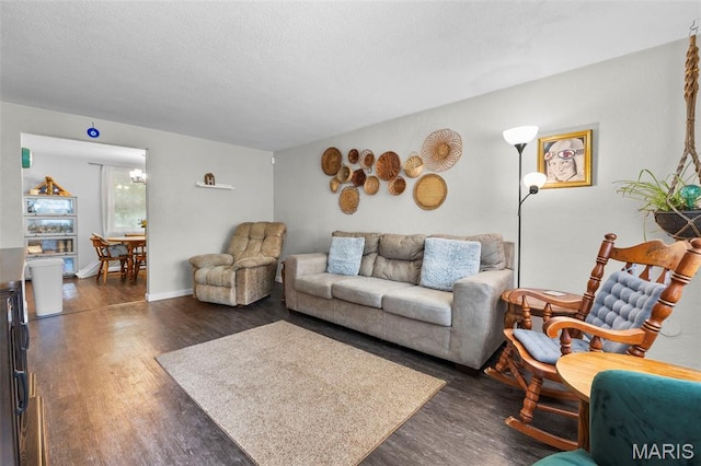 1407 Perry Ave, Cape Girardeau, MO 63701 - living area featuring dark wood finished floors and a textured ceiling