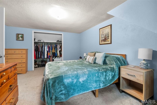 1407 Perry Ave, Cape Girardeau, MO 63701 - bedroom featuring carpet floors, a closet, and a textured ceiling