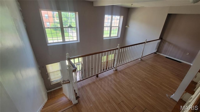 5714 Maple Ave, Saint Louis, MO 63112 - stairs with wood finished floors and baseboards
