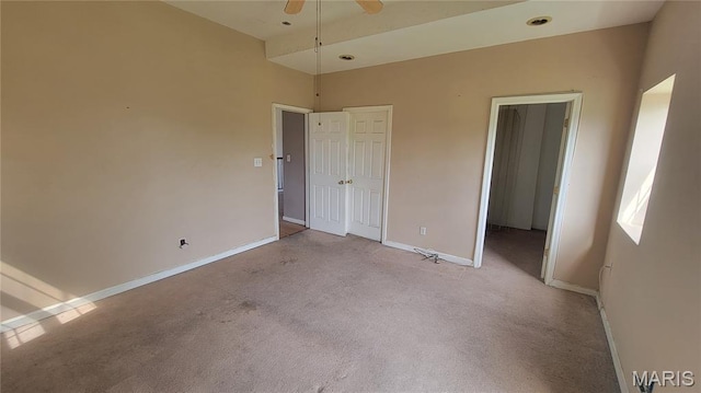 5714 Maple Ave, Saint Louis, MO 63112 - unfurnished bedroom featuring baseboards, light colored carpet, a closet, and a ceiling fan