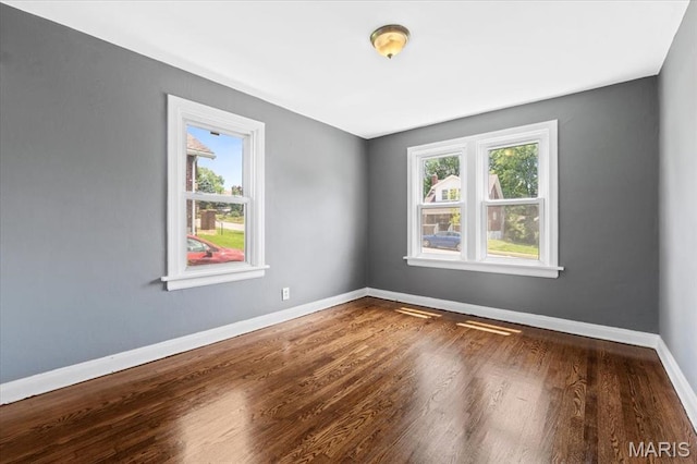 3807 Lawler Dr, Northwoods, MO 63121 - unfurnished room featuring wood finished floors
